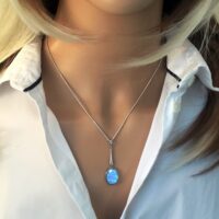 Long Blue Opal Pendant Necklace, Oval Cabochon Opal, set in...